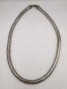 An Indian early 20th century silver rope chain necklace with hook and loop clasp. L.59cm Weight 200g
