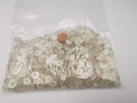 A collection of approximately three hundred and fifty loose cabochon moonstones of various shapes