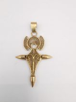 A yellow metal (tests as 14ct) Agadez filigree wirework Southern cross pedant. L.6.2 cm. Weight 9.