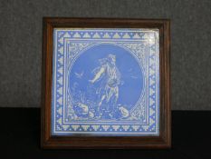 A framed Minton tile. Classical figure sowing seeds. Circa 1910. H.26 W.26 cm.