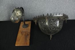 An aluminium lamp and a metal lamp shade. The lamps is probably 1950s. The shade is decorate