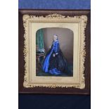 An overpainted photograph of Queen Victoria standing by a basket of flowers. Circa 1870. In a