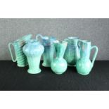 A collection of four Art Deco Beswick porcelain jugs and two vases. Circa 1930. The tallest measures