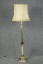 Brass standard lamp with a marble base and shade. Mid twentieth century. H.167cm.