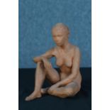 Terracotta figure, female nude. Nicely scaled and with a particularly well worked face. Unsigned.