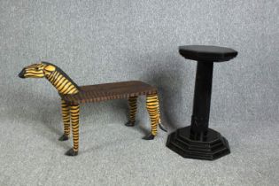 A late 19th century ebonised jardiniere stand and a painted table in the form of a zebra. H.64 cm (