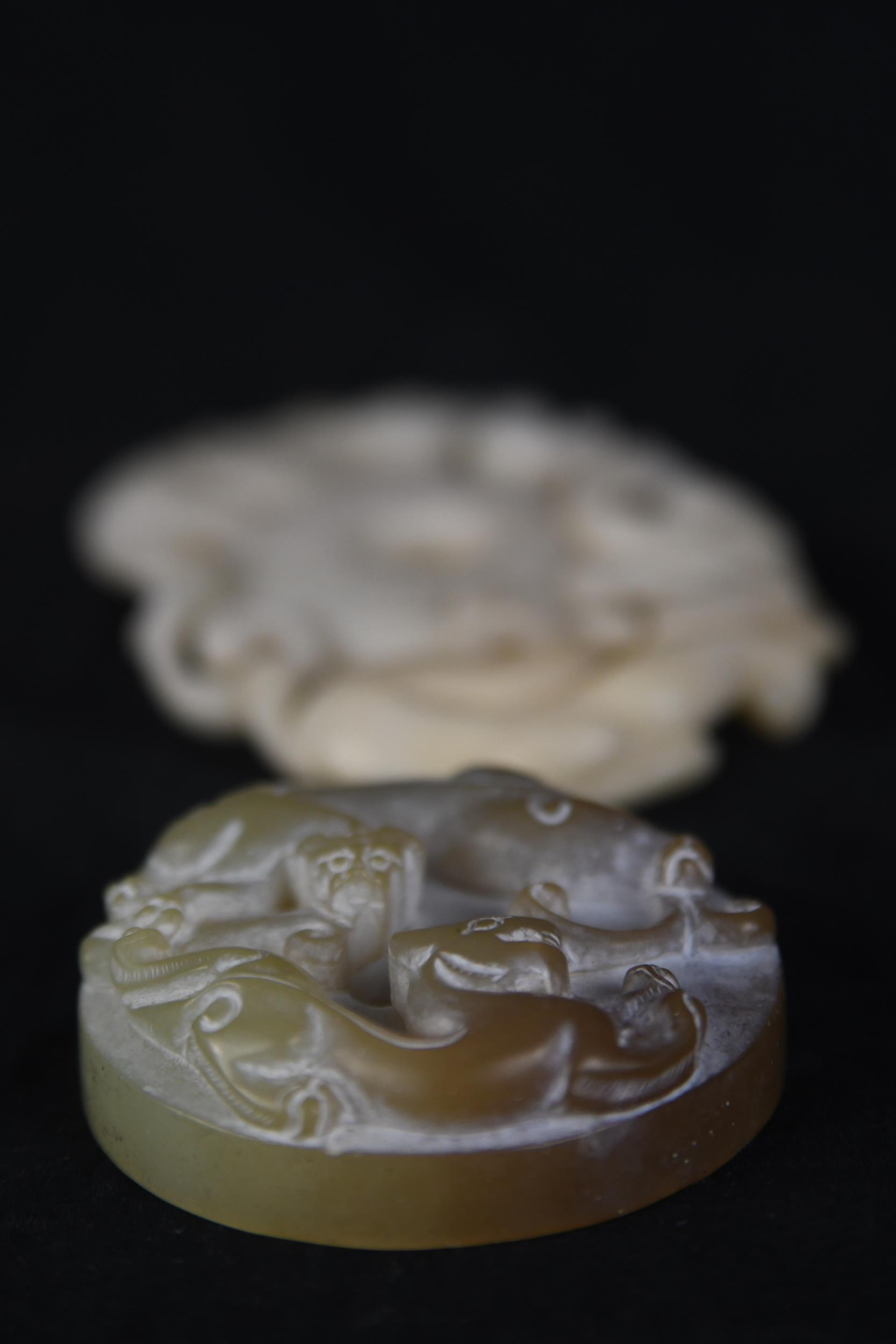 Two Chinese bi disks made of jade and soapstone. The jade design features what looks like tigers and - Image 3 of 3