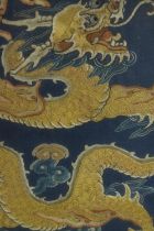 Chinese needlework. Yellow dragon. Intricately sewn with detailed dragon scales. Framed and