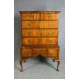 Chest on stand, early Georgian figured walnut with satinwood string inlay. H.158 W100. D.54.cm.