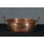 A large 19th century double handled copper pot. Well used and with a nice patina. H.15 diameter D.40