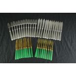 A set of eighteen desert knives & forks with green Bakelite handles and a set of twenty-four