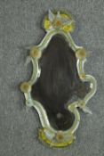 Wall mirror, C.1900, Venetian with a bevelled plate. H.86 W.48cm. (A little damage as seen).