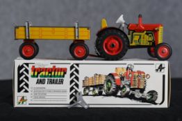 Zetor tractor with trailer. Clockwork. Tin litho toy complete with its key. Twentieth century. H.
