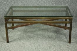 Coffee table, plate glass top on a heavy brass frame. H.40 W.90 D.50cm.