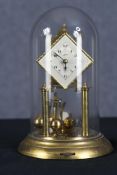 A Schatz standard 400 day clock with a diamond shaped dial. Made in Germany circa 1950. In its