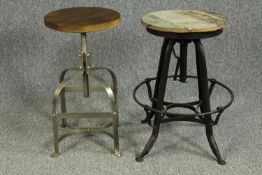 Two vintage style metal adjustable industrial stools.