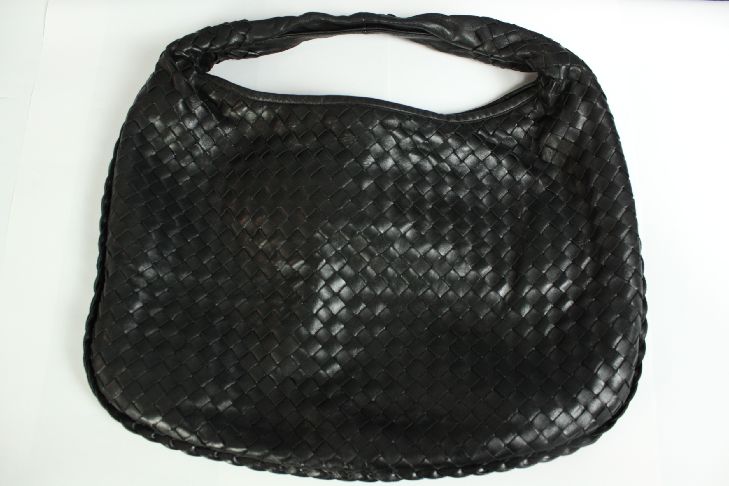 A Bottega Veneta shoulder bag. Intrecciato black leather. With a suede inlay and calf leather shell.