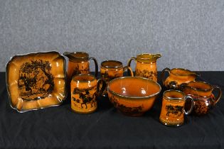 A mixed set of Ridgeway plates, jugs and cups. Coaching Days. The largest measures H.16 W.16 cm.