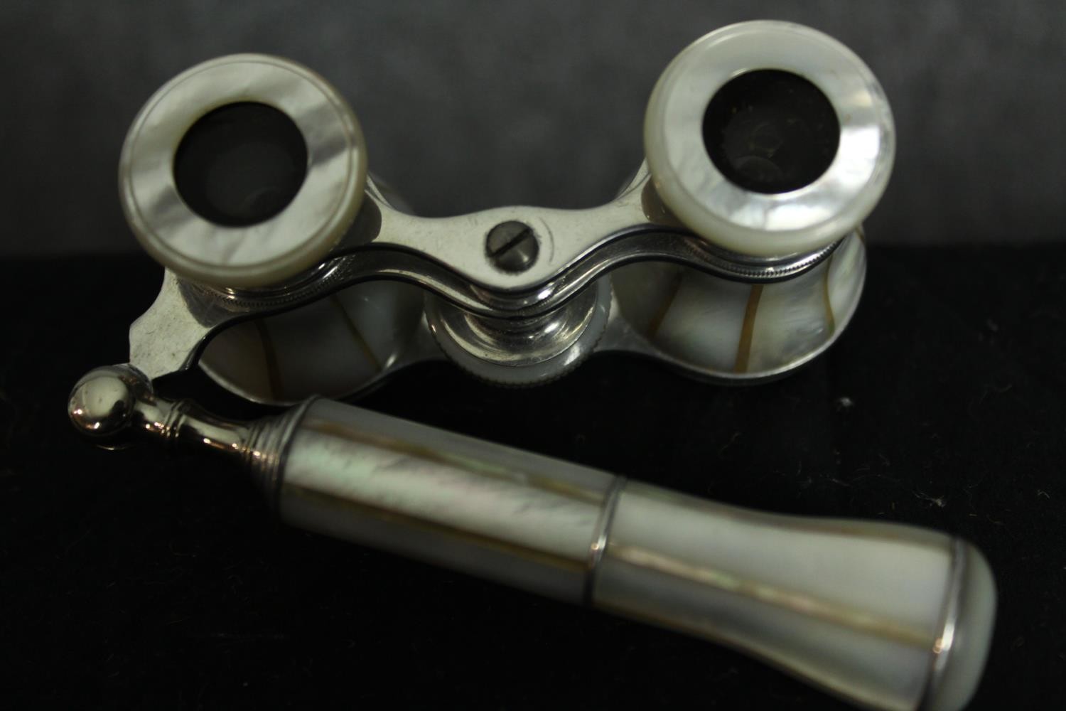 Two pairs of mother of pearl opera glasses. One with a telescopic handle. Each measure W.12 D.7 cm. - Image 3 of 5