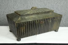 An early 19th century Anglo-Indian horn sarcophagus form tea caddy. With two compartments and a