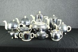 A mixed collection of heatmaster items including two teapots, two coffee pots, an ice bucket,