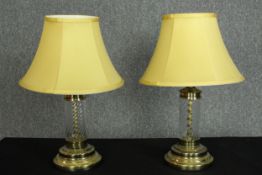 A pair of table lamps with matching shades and blown glass stems. Each measuring H.46 cm.