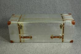 An Aviator style trunk fitted with a base drawer and leather handles and fastenings. H.44 W.120 D.