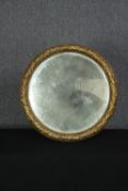 Wall mirror, 19th century gilt framed with original plate. Dia.54cm.