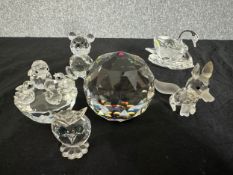 Six boxed Swarovski Silver Crystal animals and a globe paperweight. Includes a Swarovski figure
