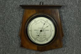 Barometer made by Wilson, made in England. H.29 W.26cm.