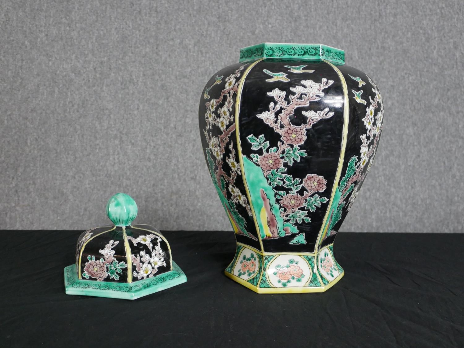 A late 20th century Chinese hexagonal form lidded ceramic urn with hand painted blossom tree and - Image 3 of 4