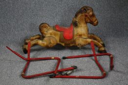 Childs ride-on metal horse with spring supports. H.55 W.100 cm.
