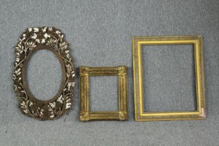 Two 19th century gilt picture frames and a mother of pearl inlaid example. H.78 W.51cm. (largest)