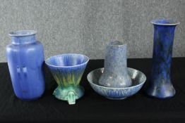 A collection of Art Deco pottery in blue and green glaze, a matching bowl and vase in a blue and