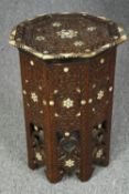 Damascus table, C.1900, carved hardwood with bone and mother of pearl inlay. H.56 Dia.40cm.