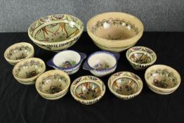 A mixed collection of hand painted ceramic bowls. H.12 Dia.26cm.