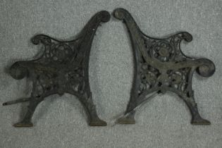 A pair of Victorian cast iron bench ends. Each measuring H.80 W.68 cm.