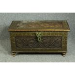Coffer, Eastern carved hardwood with pierced and studded brass mounts. H.44 W.83 D.39cm.