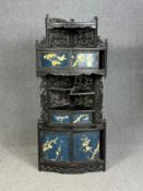 Corner cupboard, late 19th century Chinese, floor standing carved and ebonised. H.169 L.76 cm.