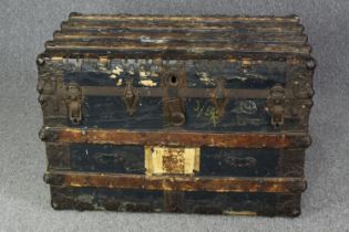 A vintage metal and timber bound seamans chest. H.63 W.92 D.33cm.