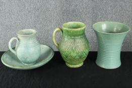 A collection of mid century ceramics, including a Crown Ducal Charlotte Read green glaze stylised