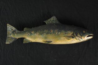 A carved wooden trout. Well detailed and painted. L.70 cm.