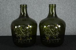 Two large green glass wine bottles. Cabernet. Each measure H.43 with a diameter of 26 cm.