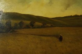 A framed early 20th century oil on canvas of a figure in a corn field, unsigned. H.48 W.68cm.