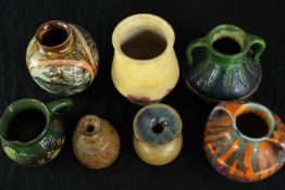 A mixed studio pottery collection by various makers including Alpho. H.15cm. (largest)