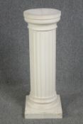 A modern plaster recreation of a Roman column. H.92 W.31 D.31 cm.