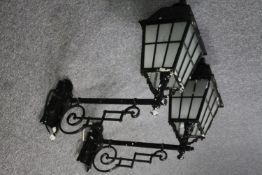 A large pair of metal exterior/street wall lamps. H.80cm. (each)