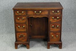 Kneehole desk, Georgian mahogany fitted with central panel door raised on bracket feet. H.80 W.89