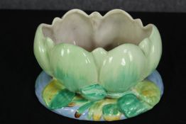 A Newport Pottery Clarice Cliff waterlily bowl with green flower. Maker's mark to base. H.13 W.23