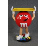 Advertising. An M&M chocolate display character on casters. H.102 W.70 D.40 cm.